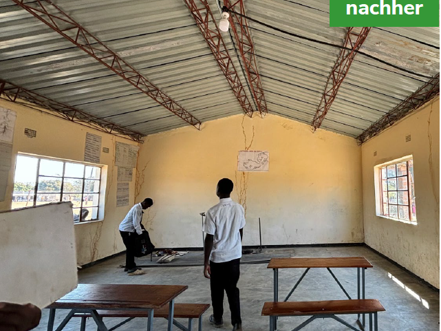 A renovated classroom with new benches and a clean, painted interior. Labeled 'after'.